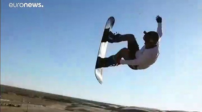 На доске по барханам