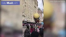 Parade marcher gets knocked down by Nutcracker Balloon