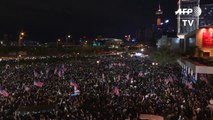 Thousands rally in Hong Kong to hail US law on city