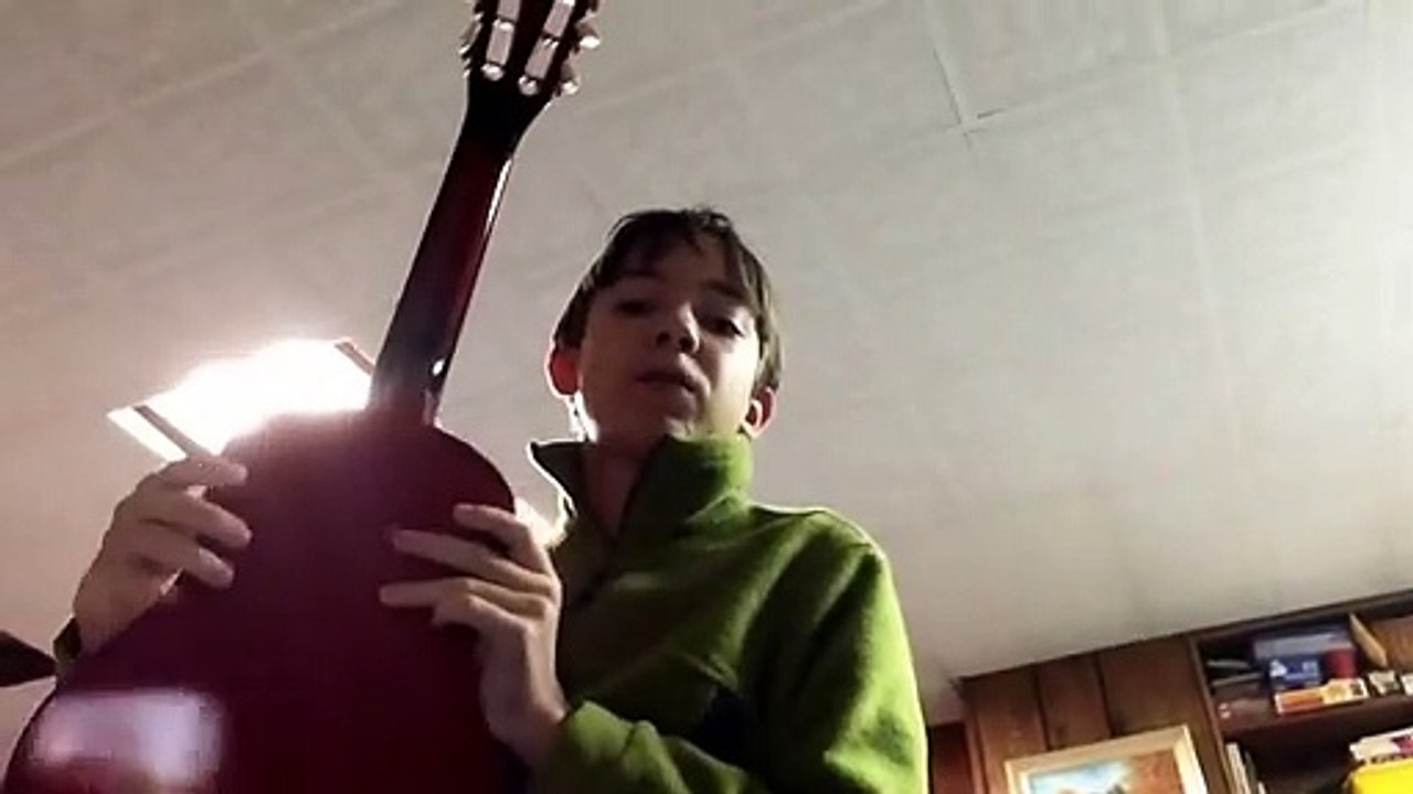 Playing a guitar