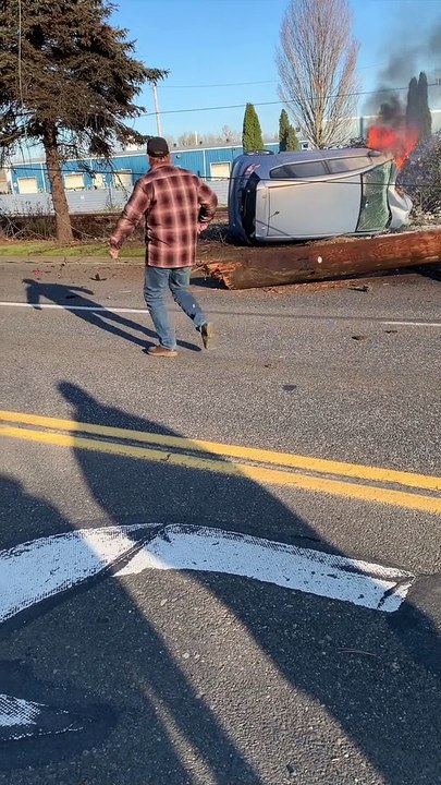 Driver Rescued from Flaming Car