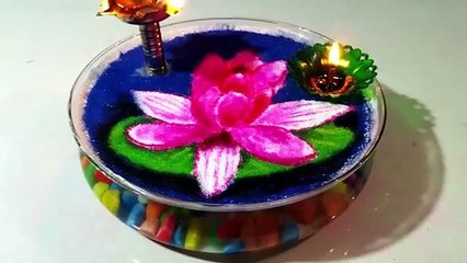 3D lotus flower rangoli on water. Festival rangoli on water.