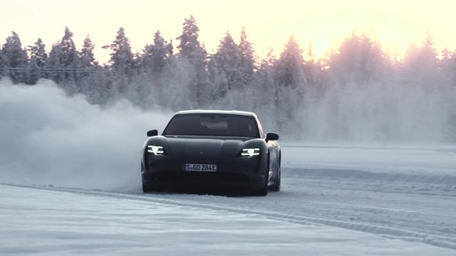 Porsche Taycan 4S in Volcano Grey Ice driving