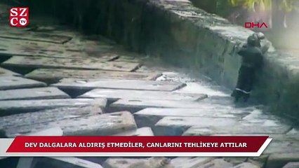 Télécharger la video: Dev dalgalara aldırış etmeyip canlarını tehlikeye attılar