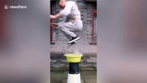 Chinese man shows off incredible kung fu skills by jumping on water