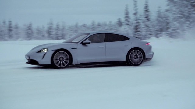 The new Porsche Taycan 4S in Dolomite Silver Ice Driving