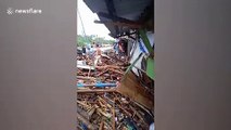 Typhoon Kammuri victims return to their damaged homes after storm
