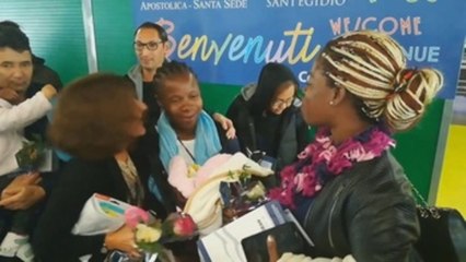 Los 33 refugiados del papa llegan a Roma