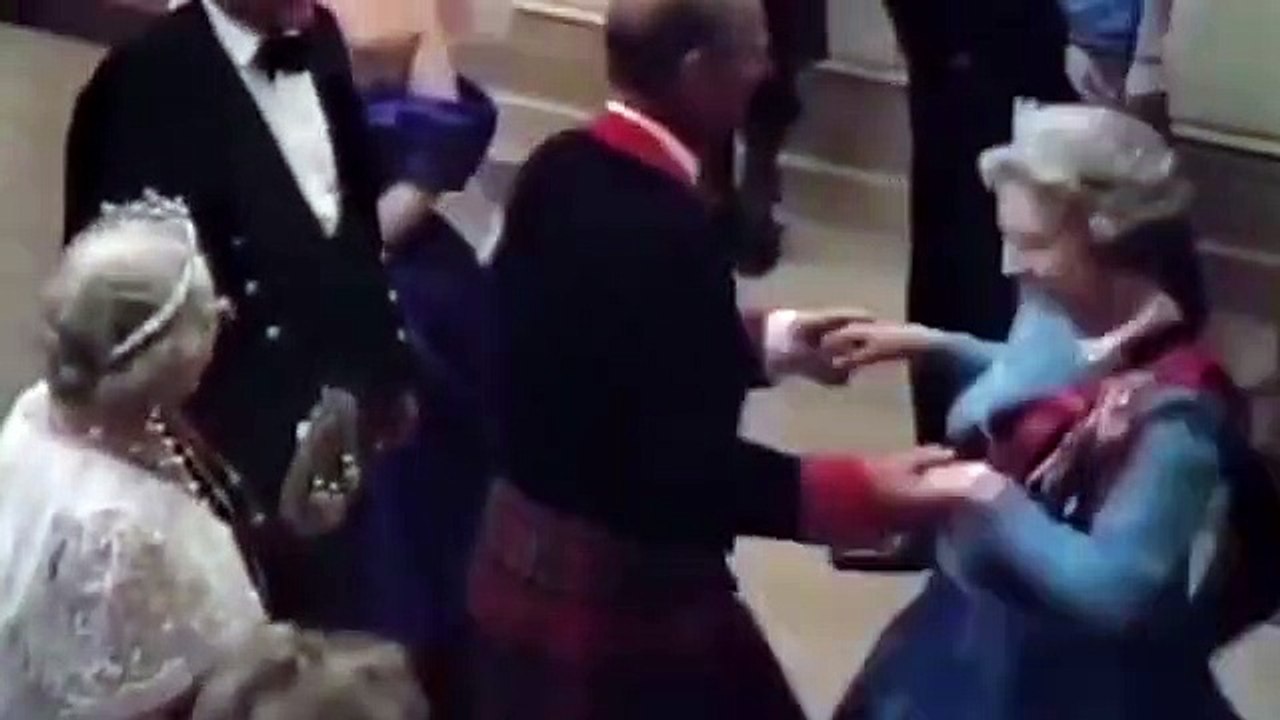 Queen dances with Princess Diana and her mother at the Ghillies Ball