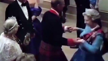 Queen dances with Princess Diana and her mother at the Ghillies Ball