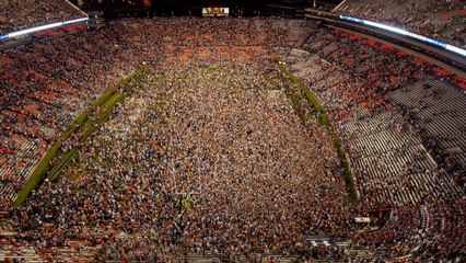 Auburn Fans Attempting to Rush Field Get Stuck in Bushes