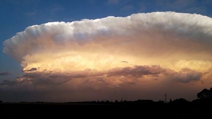 Beautiful Cumulonimbus Storm Illuminates in Sunset