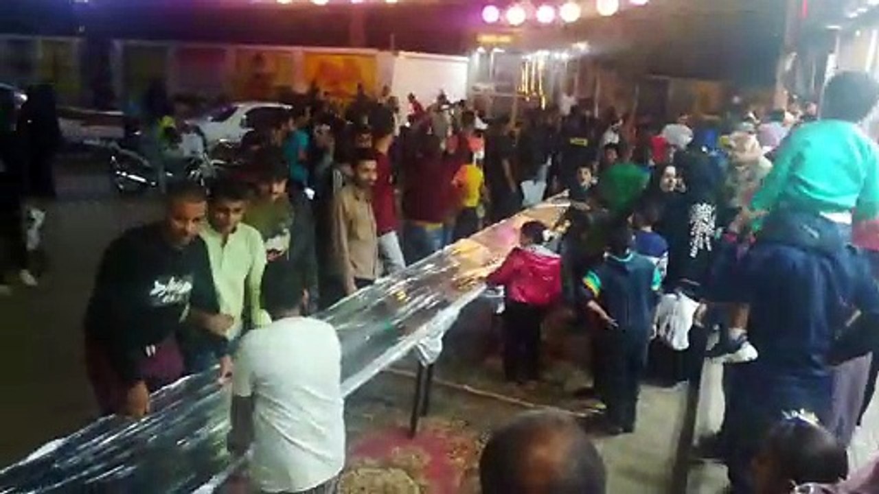 People Gathered In First Live Event '  longgest Free Sandwich ' Black Friday Gift