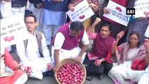 P Chidambaram, Congress leaders protest against onion price hike at Parliament