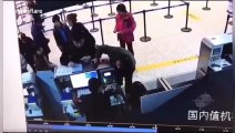 Chinese man violently rips off airport worker's employee card after arguing with her