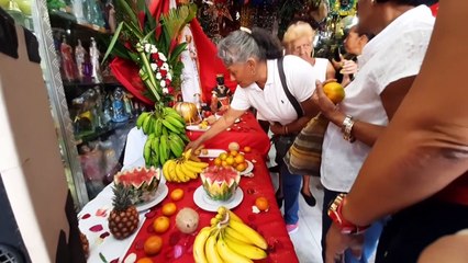 Tabaco, licor y tambor: Venezolanos piden a Santa Bárbara que “se acabe la crisis”