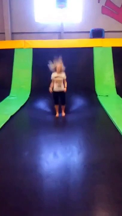 Girl Flips On Trampoline And Lands On A Kid