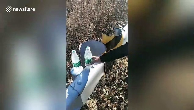 Bottled mineral water freezes in seconds when smashed against metal in northern China