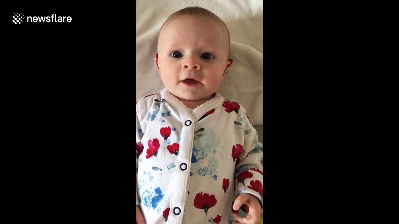 Watch adorable deaf baby smile from cheek-to-cheek when hearing aid is switched on