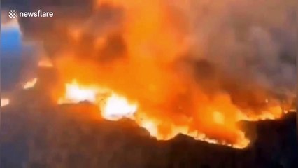 Helicopter used to combat major mountain fire in southern China