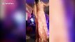 Horrifying moment dancer at Indian wedding takes a break and gets SHOT in the face