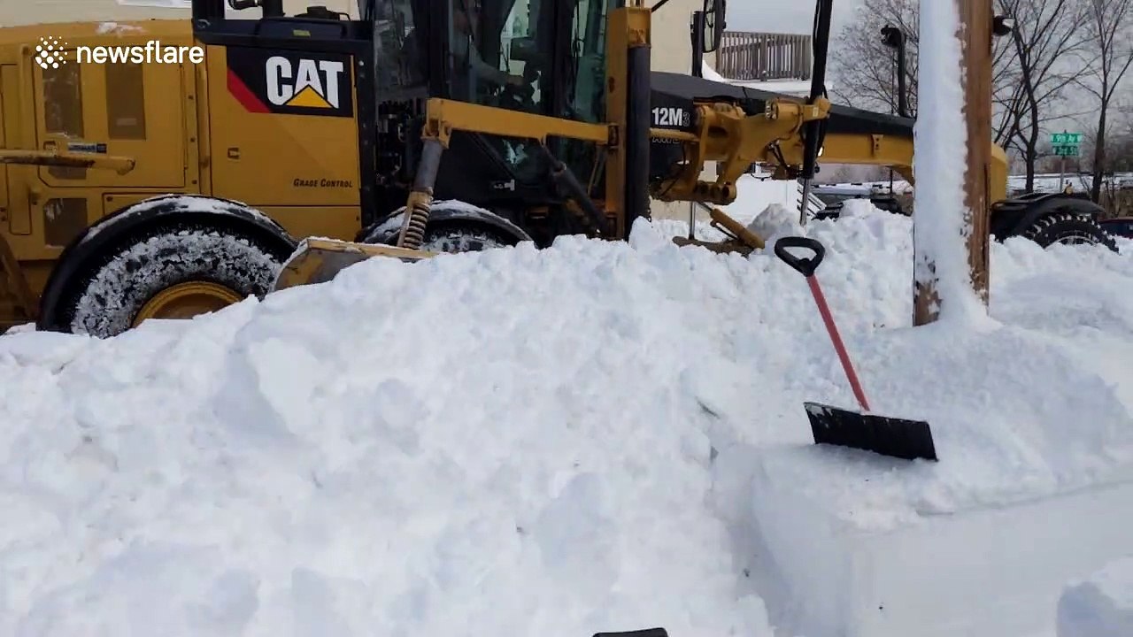 US neighbours look on in disbelief as truck pushes snow back onto sidewalk they spent 20-minutes clearing