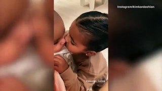 Kim Kardashian films True Thompson giving Psalm a big kiss