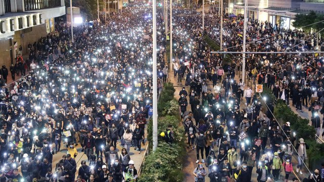 Hundreds of thousands joined Hong Kong’s first march approved by police since August