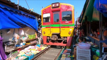 Maeklong Railway Market at Samut Songkhram  In Thailand