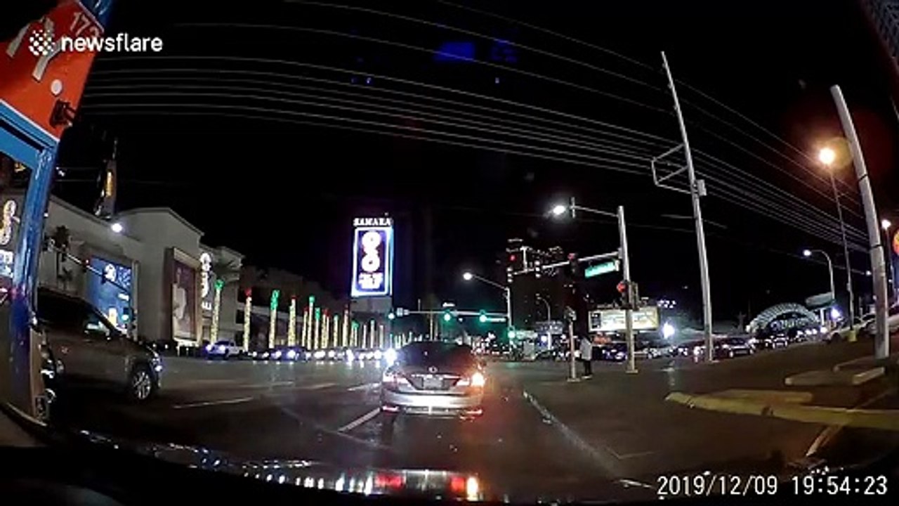 Police seen responding to barricade at gift store in Las Vegas