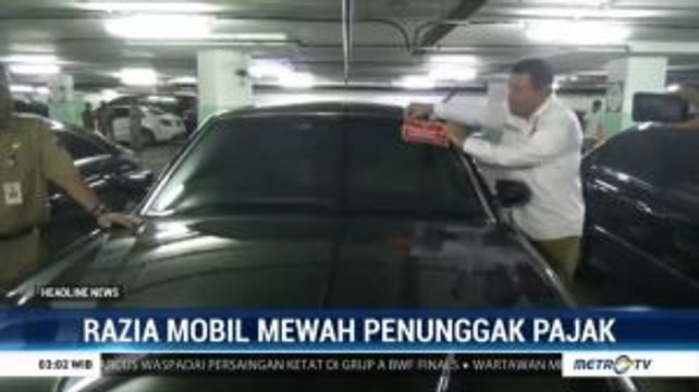 Petugas Gabungan Razia Mobil Mewah Penunggak Pajak