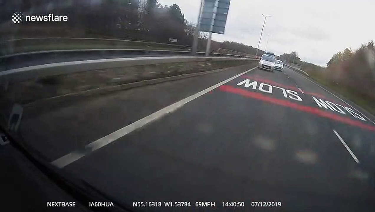 Dashcam records reckless driver ramming other vehicle trying to overtake on UK highway partition