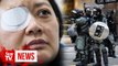 Hong Kong-based Indonesian journalist seeks justice after losing right eye