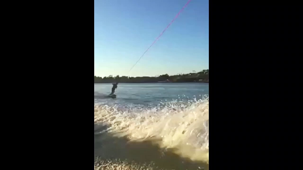 Guy On Wakeboard Does A Trick And Lands Face First Into The Water
