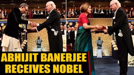 Video herunterladen: Abhijit Banerjee receives Economics Nobel in Dhoti-Bandhgala | OneIndia News