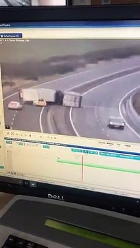 Watch the jaw-dropping moment a lorry blew on top of a police car during Storm Brendan on the A1 in East Lothian