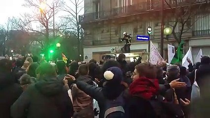 Firefighter leads 'Viking clap' during protest against Macron's reforms in Paris