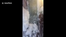 This footage of an Icelandic man navigating his house encased in snow after a blizzard is wild