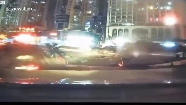 Moment two cars get swallowed up by huge sinkhole in China