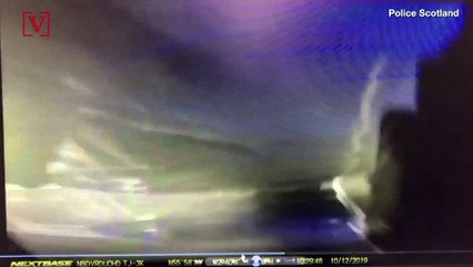 MUST SEE: High Winds In Scotland Causes Truck To Topple Over Onto a Police Car