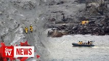 New Zealand retrieves bodies from volcanic island