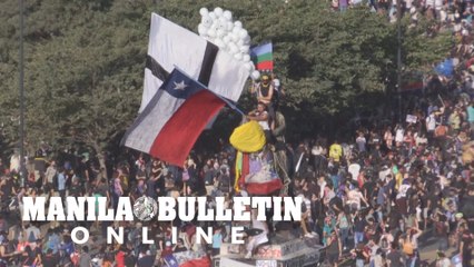 Police clash with demonstrators in Chile during massive protest