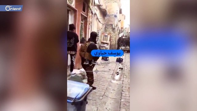 قوات الأمن العراقية تشارك في القبض على مطلق النار على المتظاهرين وتلقيه في ساحة التظاهرات