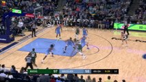 Giannis rocks the rim over defender