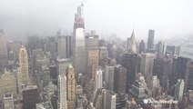 Snow squall completely obscures Manhattan skyline
