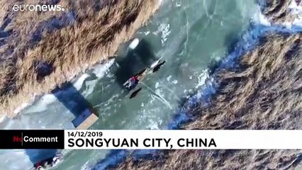 شاهد: الصيادون الصينيون يكرمون البحيرة وشباك الصيد بمناسبة إفتتاح الموسم