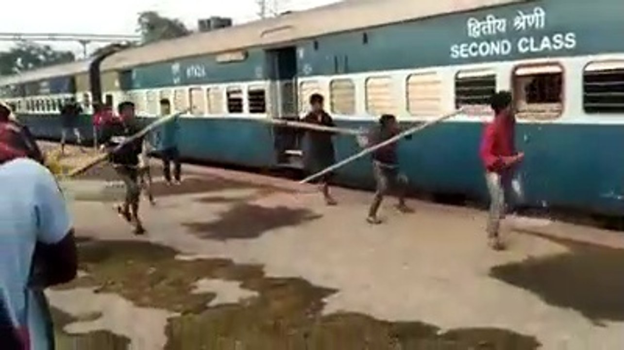 WatchVideo: Teenage boys attacks a Train in Malda, West Bengal