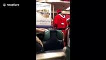 Shocking moment man dressed as Santa STABBED on NYC subway by 'old, drunk, homophobic' man