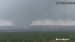 Drone video shows stovepipe tornado roaring over trees