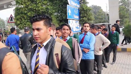 Hundreds of fans queue for tickets as test match cricket returns to Pakistan for first time in 10 years
